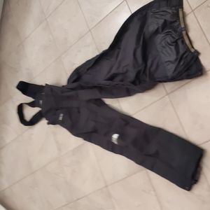 North face extra small men's bibs, zips up the side. Non-insulated gortex